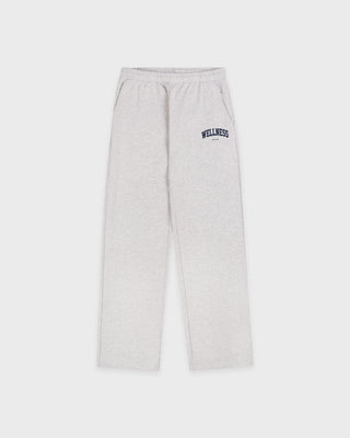 Wellness Ivy Wide Sweatpant in Heather Gray/Light Navy, featuring "WELLNESS" text on the left pocket and crafted from 100% cotton with an elastic waistband, displayed on a plain white background.