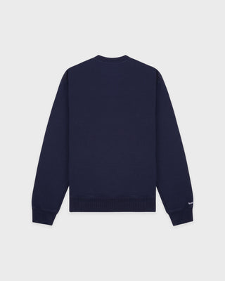 Introducing the LA Serif Crewneck in Dark Navy/White, a 100% cotton crewneck sweatshirt featuring a white LA logo on the upper left chest.