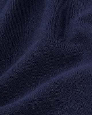 The LA Serif Zip Hoodie in Dark Navy/Navy features a zip front, LA logo on the left chest, and front pockets. Made from 100% cotton for comfort, this oversized hoodie is shown on a white background.