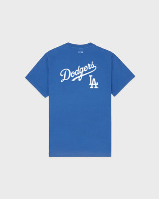 Dodgers Serif T-Shirt in Team Blue/White, featuring an LA logo and Sporty & Rich text on the front, crafted from 100% cotton for comfort, designed with an oversized fit, and shown against a plain background.
