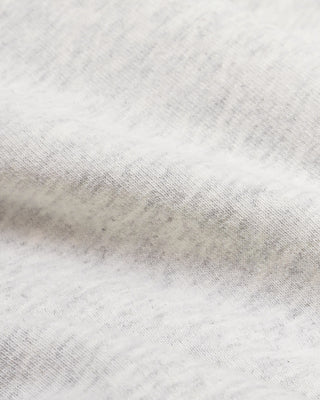 LA Serif Zip Hoodie in Heather Gray/White, featuring a zipped front, LA logo on the chest, front pockets, and crafted from 100% cotton in an oversized fit, shown laid flat on a white background.