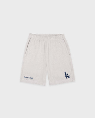 Dodgers Serif Gym Short in Heather Gray/Navy features an elastic waistband, side pockets, and navy Sporty & Rich and LA logos on the legs. Made in Portugal from 100% cotton for comfort and style.