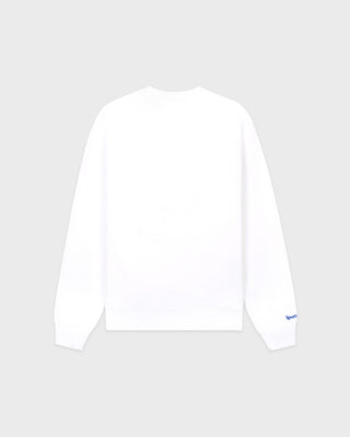 LA Serif Crewneck - White/Team Blue features an oversized fit and is made from 100% cotton, showcasing a blue LA logo on the upper left chest. Displayed on a plain light gray background.