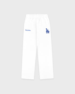 LA Serif Wide Sweatpant - White/Team Blue, crafted in Portugal from 100% cotton, features a wide-leg silhouette with blue LA and Sports Rich logos and is displayed on a plain light gray background.