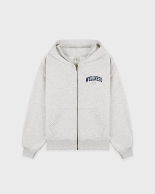 Presenting the Wellness Ivy Zip Hoodie in Heather Gray/Light Navy: an oversized-fit, 100% cotton zip-up hoodie featuring "WELLNESS" in light navy text on the left chest, complete with front pockets and a comfortable hood.