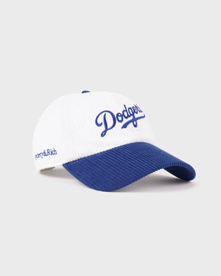 Dodgers Corduroy Hat - White/Team Blue features "Dodgers" text embroidered on the front, crafted in white and blue corduroy with an adjustable closure for a comfortable fit.