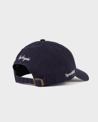 Introducing the LA Hat - Dark Navy/White: a dark navy baseball cap with a white embroidered LA logo on the front, shown against a simple backdrop and designed with an adjustable closure to ensure a comfortable fit.