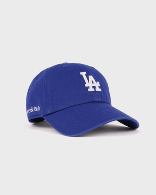 The LA Hat - Team Blue/White is shown from the front against a plain background, featuring a blue design with an embroidered white LA logo and an adjustable closure for a comfortable fit.