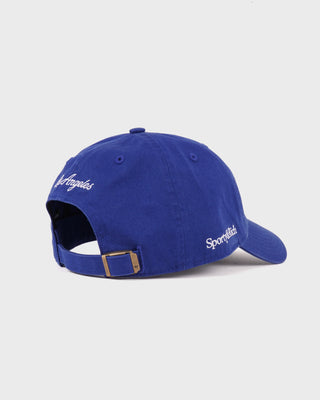The LA Hat - Team Blue/White is shown from the front against a plain background, featuring a blue design with an embroidered white LA logo and an adjustable closure for a comfortable fit.