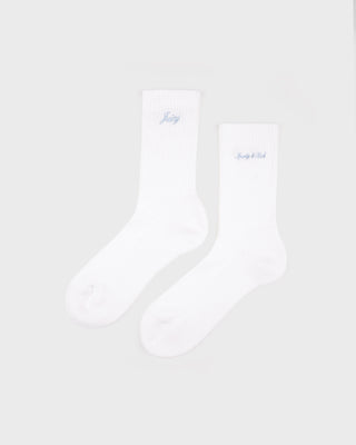 White socks with blue branding on a white background