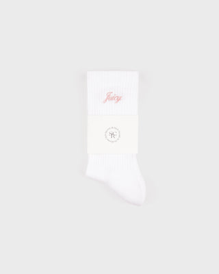 White pocket square with 'Freddy' embroidery on a white background