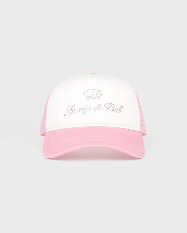 Pink and white cap with 'Sporty & Rich' logo on a light gray background