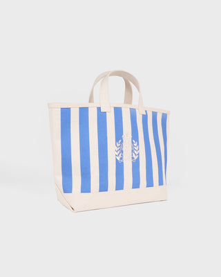 Tote bag with blue and white striped pattern on a light gray background