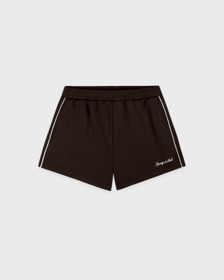 Black shorts with white trim on a light gray background