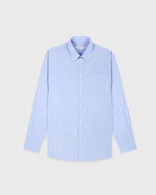Light blue striped shirt on a light gray background