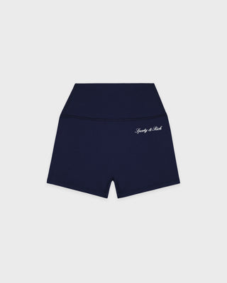 Navy blue shorts with a brand logo on a light gray background
