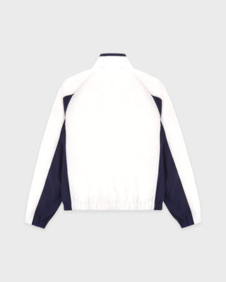 White and navy jacket on a light gray background
