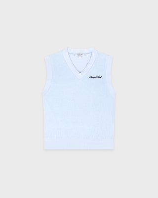 Light blue sleeveless top with brand logo on a beige background