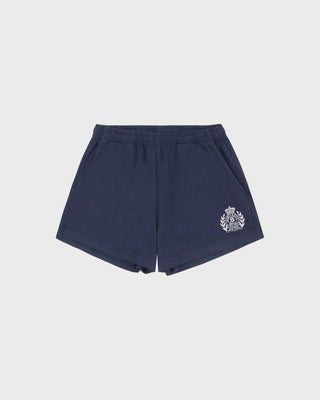 Navy shorts with a logo on a light gray background
