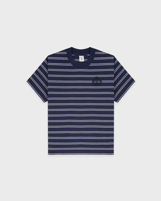 Navy and white striped t-shirt on a light gray background