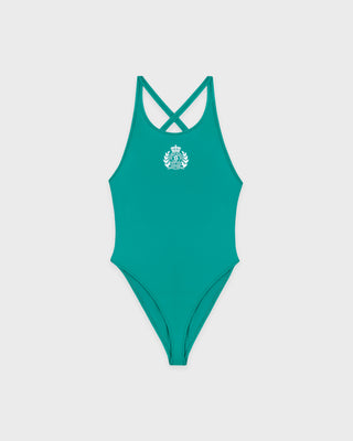 Green swimsuit with a logo on a light gray background