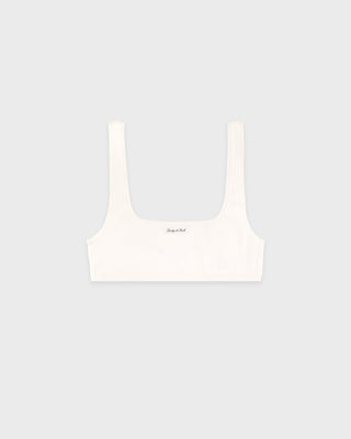 White bralette on a light gray background