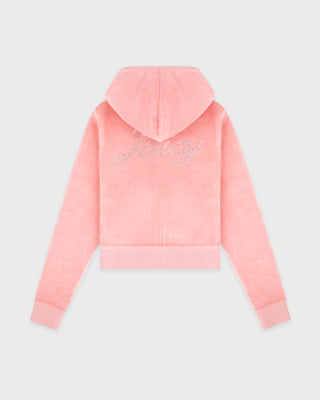 Pink hoodie with decorative elements on a light gray background