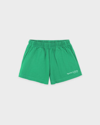 Green athletic shorts with an elastic waistband and a small white 'Sporty & Co.' logo on the lower left leg, shown flat against a light gray background.