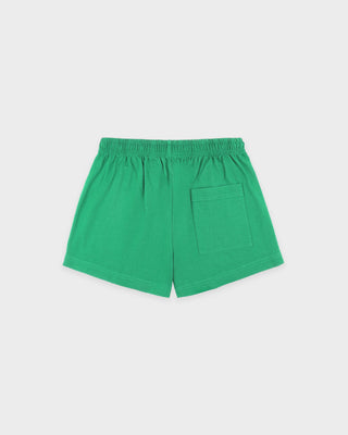 Green athletic shorts with an elastic waistband and a side pocket, shown flat on a light gray background.