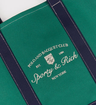 Green tote bag with 'Sporty & Rich New York' branding on a white background