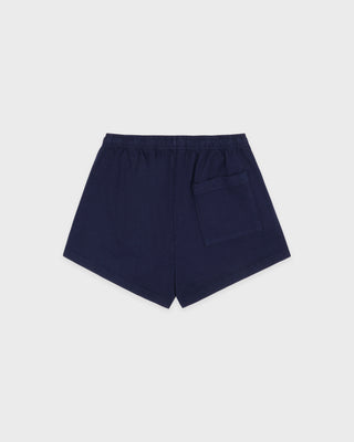 Navy blue shorts on a light gray background
