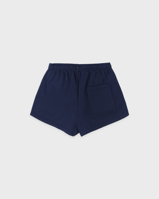 Navy blue shorts on a light gray background