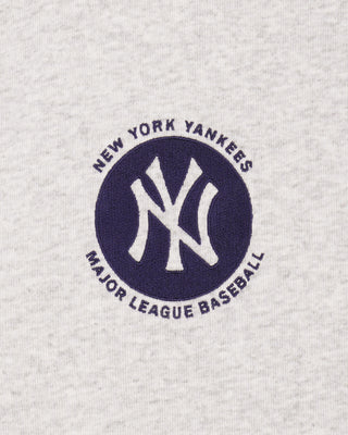 New York Yankees logo on a textured gray background