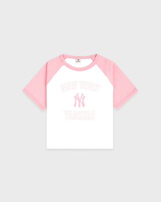 Pink and white baseball-style t-shirt with logo on a light gray background
