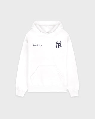 White hoodie with black logo on a light gray background