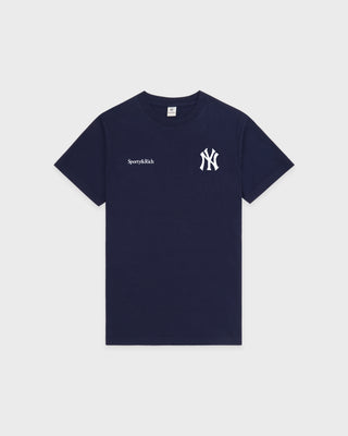 Navy blue t-shirt with a logo on a light gray background