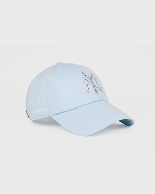 Light blue baseball cap with text on a light gray background