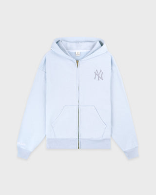 Light blue hoodie with a logo on a light gray background