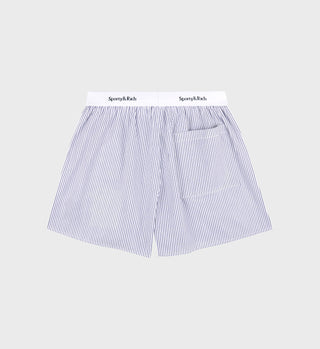 Striped boxer shorts with 'Sporty & Rich' branding on a light gray background
