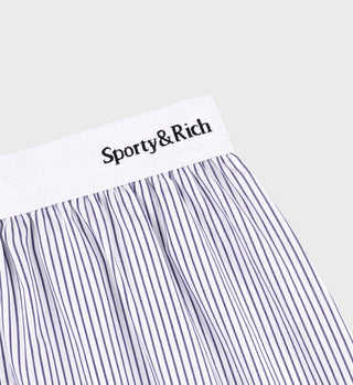 Striped underwear with 'Sporty & Rich' label on a white background