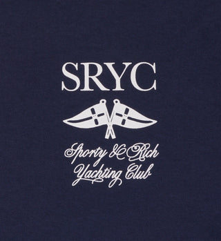 The Yatch Club T-Shirt - Navy/White features SRYC Sporty & Rich Yachting Club and crossed flags in white. Made in the USA from 100% USA-grown cotton.