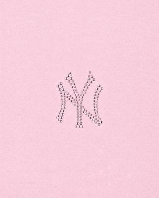 Pink background with a decorative letter 'W' made of smaller letters.