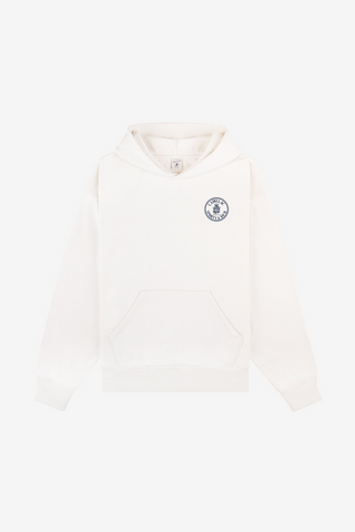 Ecru white Cadillac x Sporty & Rich Tamia Hoodie with a front pocket and a small blue circular logo on the upper left chest, laid flat on a white background. Crafted from premium USA-grown cotton for exceptional comfort and style.
