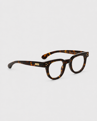 Frame N.04 - Blue Light Glasses - Tortoise, featuring round tortoiseshell frames and clear lenses, photographed on a plain white background.