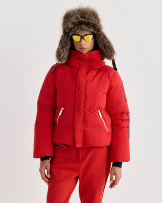 Bright red Drea Bold Logo Ski Jacket - Rosso with black text on the left sleeve and zippered pockets.