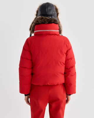 Bright red Drea Bold Logo Ski Jacket - Rosso with black text on the left sleeve and zippered pockets.