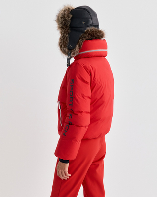 Bright red Drea Bold Logo Ski Jacket - Rosso with black text on the left sleeve and zippered pockets.