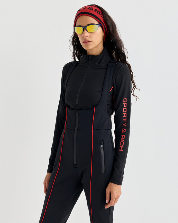 Vilma Bold Logo Alpine Quarter Zip - Black thermal long-sleeve with red side stripes and red text on the right sleeve.