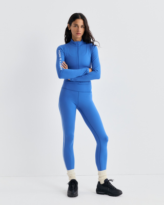 Freya Bold Logo Sports Jacket in vibrant blue with white logo text on the right sleeve.
