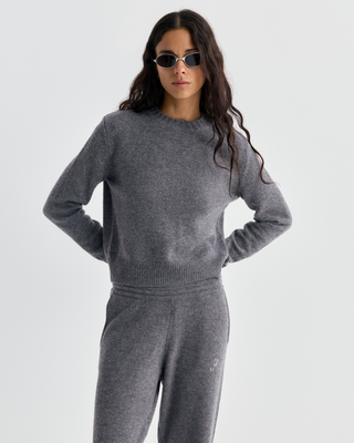 Itzel S Logo Cashmere Sweater in medium heather gray, a long-sleeved crewneck with a small chest logo.